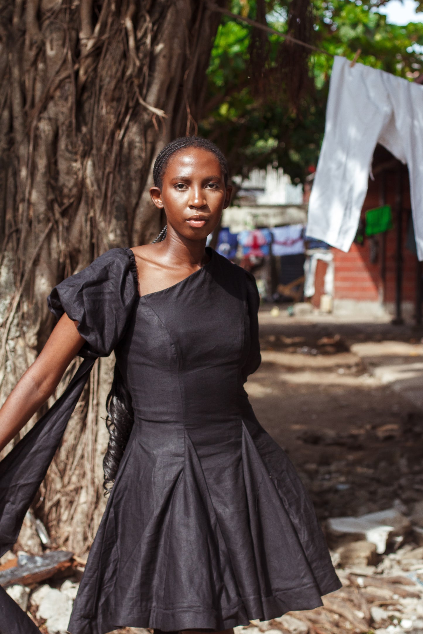 The Taiwo Ade Asymmetrical Puff-Sleeve Fit-and-Flare Dress in Textured Ivory