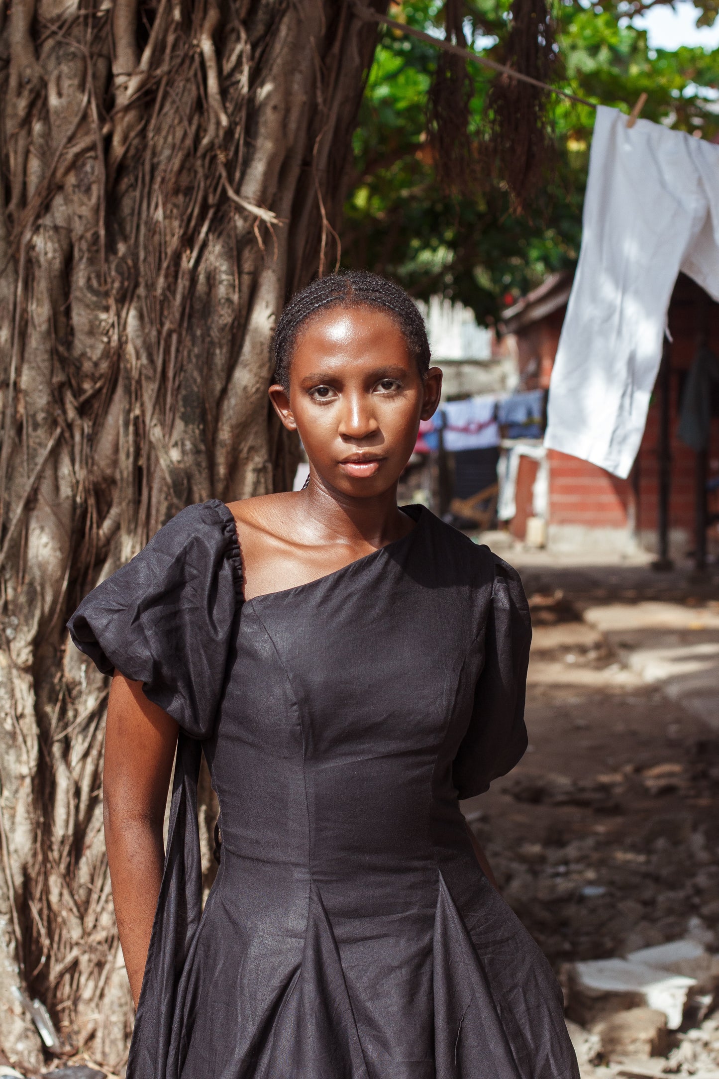 The Taiwo Ade Asymmetrical Puff-Sleeve Fit-and-Flare Dress in Textured Ivory
