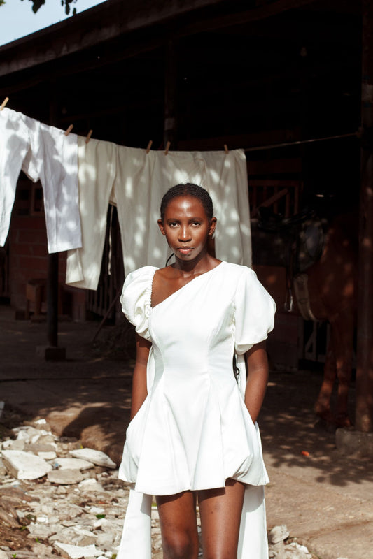 The Taiwo Ade Asymmetrical Puff-Sleeve Fit-and-Flare Dress in Textured Ivory
